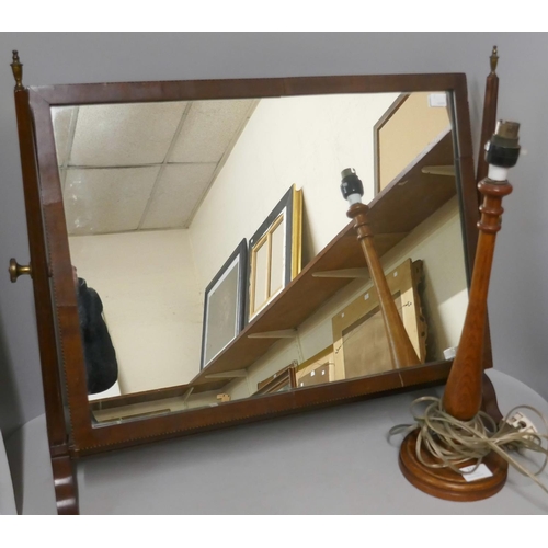 314 - An oak table lamp and a Victorian mahogany toilet mirror