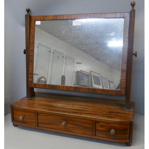 317 - A George IV mahogany toilet mirror