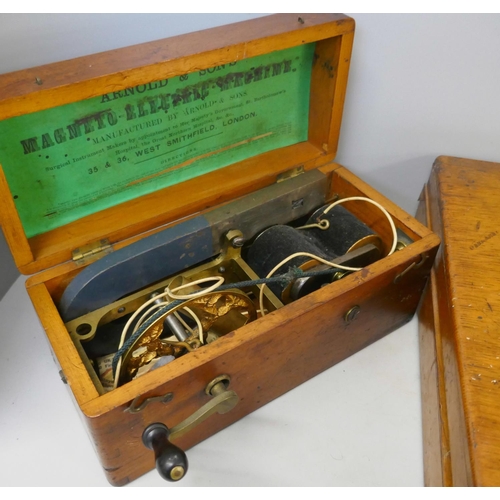 323 - A wooden case of plated cutlery and an electric shock machine