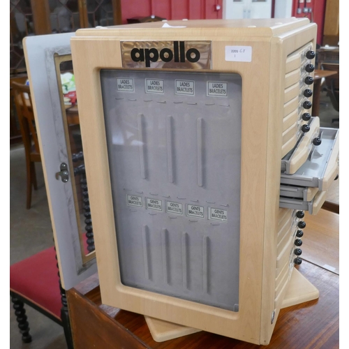 336 - An Apollo revolving shop display stand for watch straps