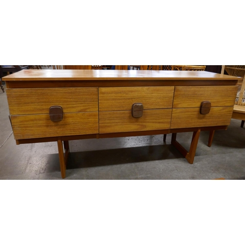 39 - A teak six drawer sideboard