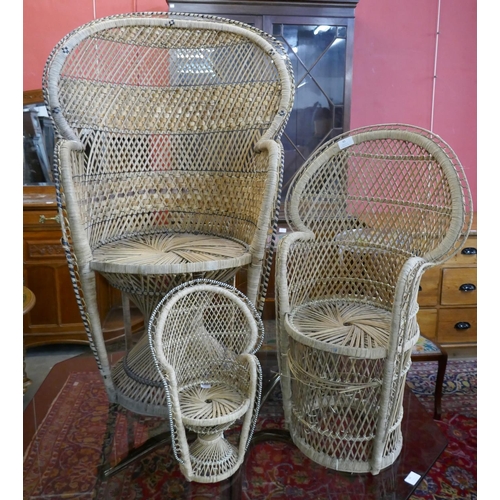 45 - A set of three Italian graduated wicker peacock chairs