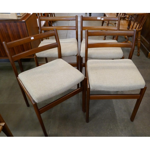 6 - A set of four teak dining chairs