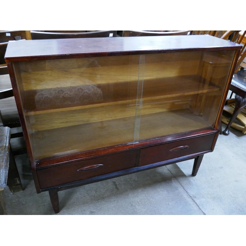 65 - A teak bookcase