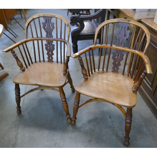 72 - A pair of 19th Century elm and yew Windsor chairs