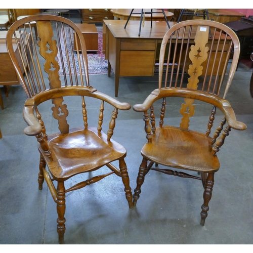 78 - A pair of 19th Century elm and beech Windsor highback armchairs