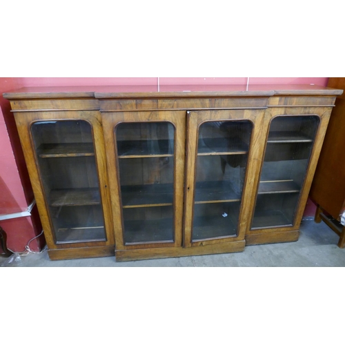 79 - A Victorian walnut breakfront four door bookcase