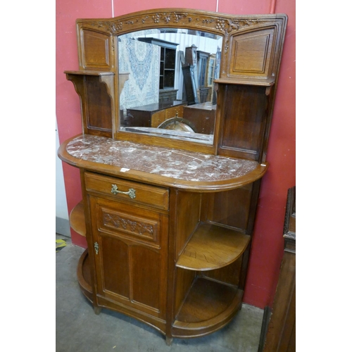 83 - A 19th Century French oak and marble topped mirrorback side cabinet