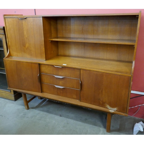 9 - A teak highboard