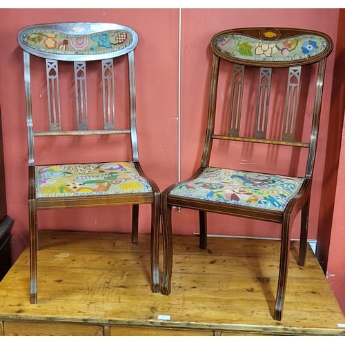 84 - A pair of Arts and Crafts inlaid mahogany lady's chairs