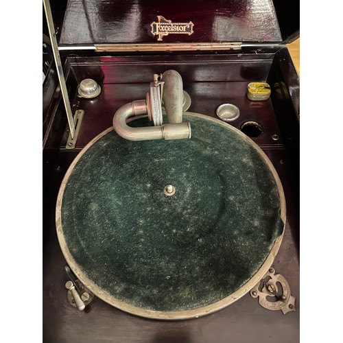 2181A - An Excelsior gramophone record player including a quantity of records and gramophone needles