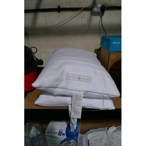 3018 - Two Hotel Grand Down Roll Jumbo Pillows (One Ripped) (312-80) * This lot is subject to VAT