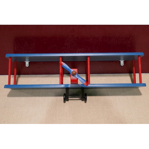 3157A - A red and blue bi-plane wall shelf