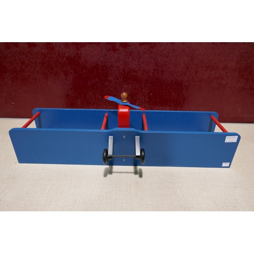 3157A - A red and blue bi-plane wall shelf