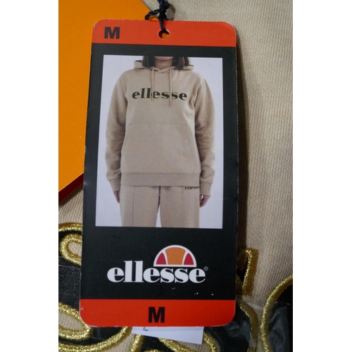 3159 - A lady's Ellesse pink tracksuit - size M and A lady's Ellesse tracksuit - beige - size M * This lot ... 