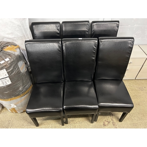 1636 - A set of six black vegan leather dining chairs