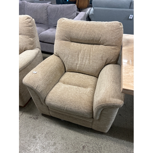 1638 - A beige parker Knoll armchair