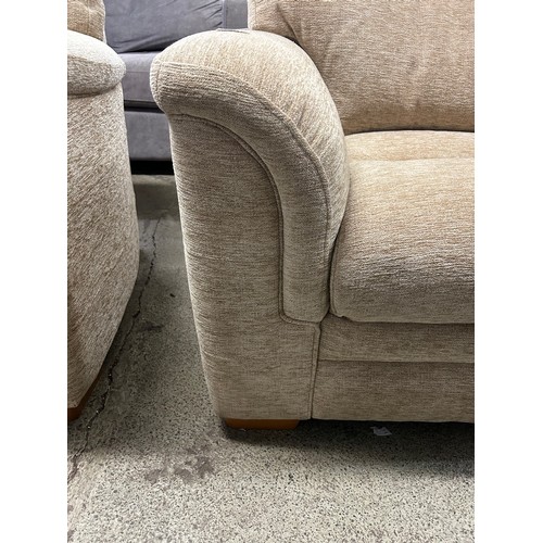 1638 - A beige parker Knoll armchair