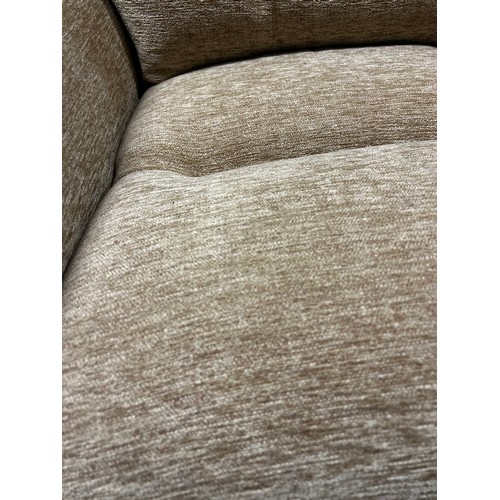 1638 - A beige parker Knoll armchair