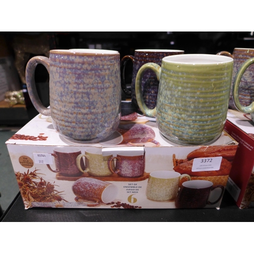 3372 - 4 Reactive glaze mugs (312-808)  * This lot is subject to vat