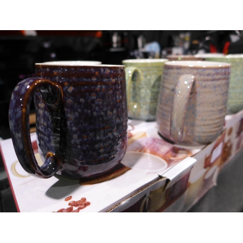 3372 - 4 Reactive glaze mugs (312-808)  * This lot is subject to vat