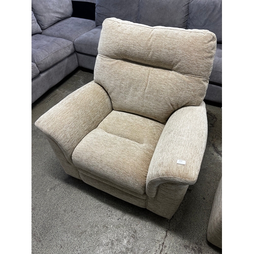 1639 - A beige parker Knoll armchair