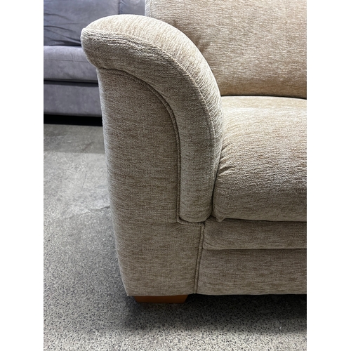 1639 - A beige parker Knoll armchair