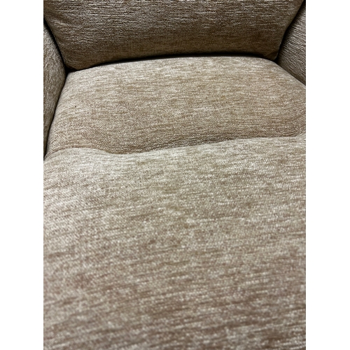 1639 - A beige parker Knoll armchair