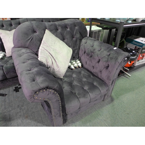 3405 - A two-piece grey velvet studded sofa and armchair with feet