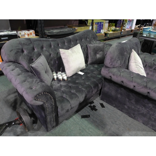 3405 - A two-piece grey velvet studded sofa and armchair with feet