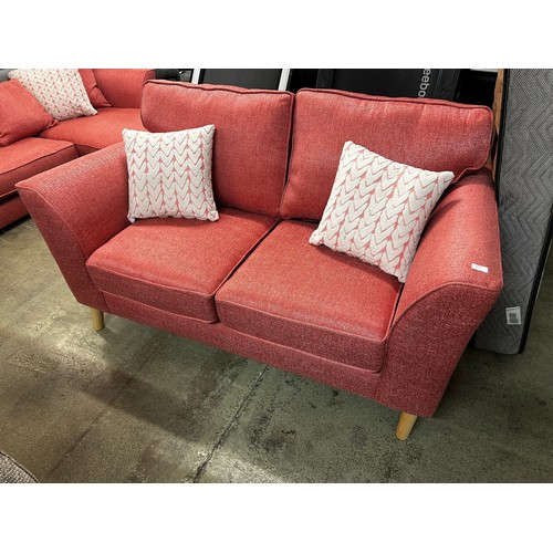 1604 - A bubblegum pink scatterback 2.5 seater sofa