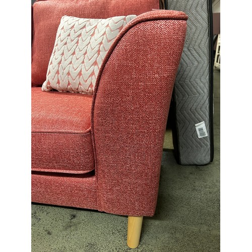 1604 - A bubblegum pink scatterback 2.5 seater sofa