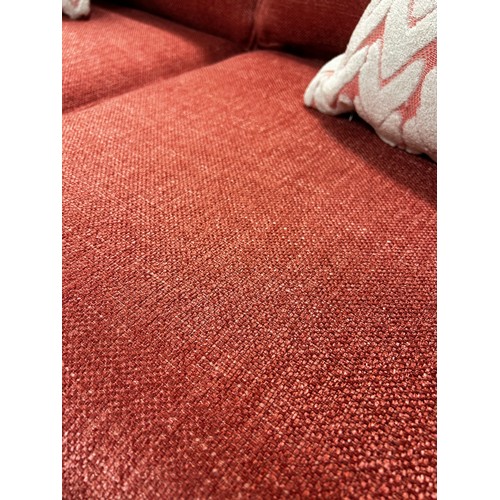 1604 - A bubblegum pink scatterback 2.5 seater sofa