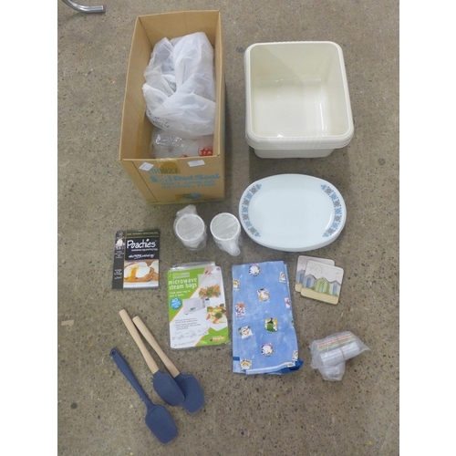 2291 - A quantity of kitchenware including washing up bowls, spatulas, coasters, plates, mugs etc