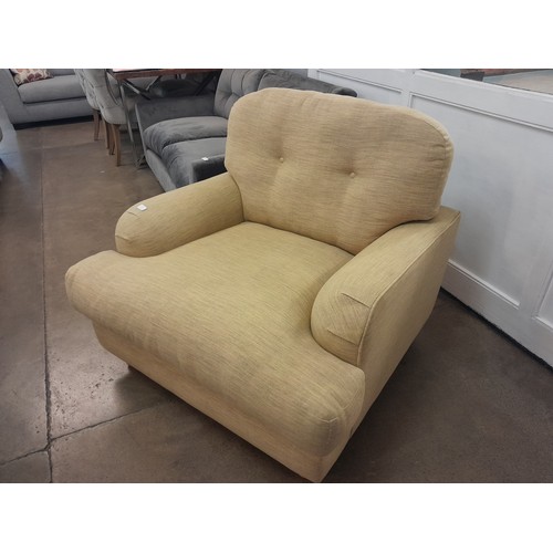 1331 - A Dijon flecked fabric upholstered oversized armchair