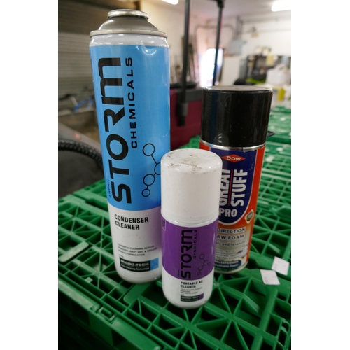 2317 - A box of various spray cans including Storm Chemicals condenser clear and Storm Chemicals portable A... 