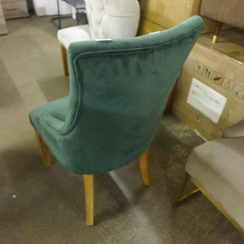 1374 - A green velvet side chair * This lot is subject to VAT