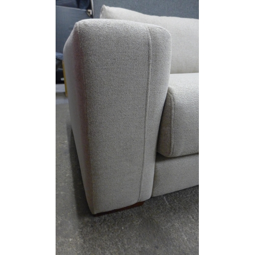 1432 - A sandstone weave four seater sofa