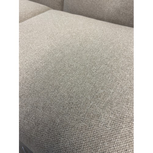 1442 - An oatmeal textured weave upholstered two seater sofa bed
