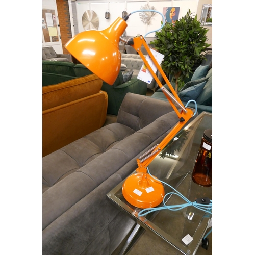1307 - An orange anglepoise table lamp