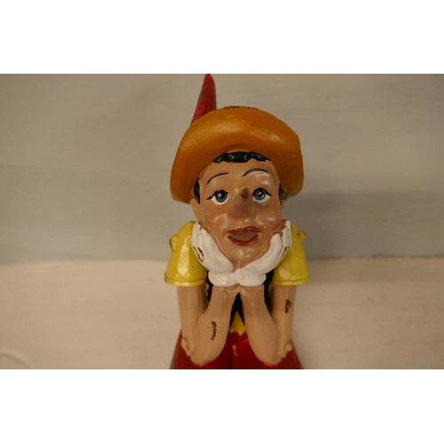 1328 - A sitting Pinocchio figure (RM5410)