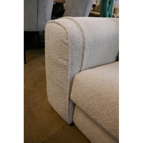 1349 - An ivory upholstered three seater sofa RRP £1099