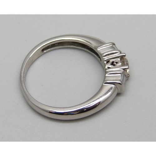 1003 - An 18ct white gold and diamond ring, 4.2g, M, centre stone approximately 0.25ct weight