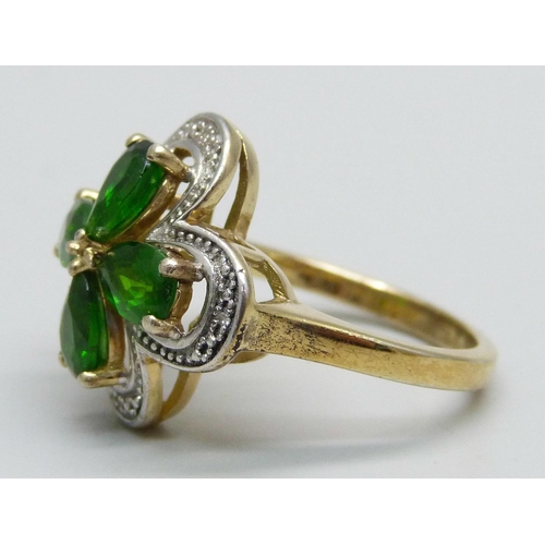 1016 - A silver gilt, diopside cluster ring with diamond accents, L