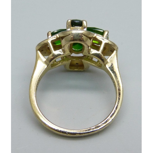 1016 - A silver gilt, diopside cluster ring with diamond accents, L