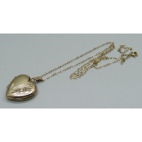 1036 - A 9ct gold locket and chain, 2.6g