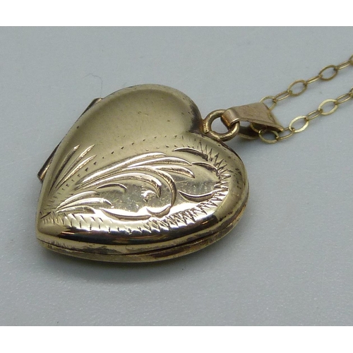 1036 - A 9ct gold locket and chain, 2.6g