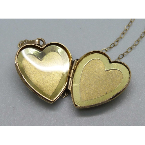 1036 - A 9ct gold locket and chain, 2.6g