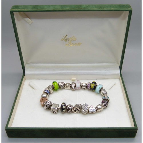 1047 - A Pandora charm bracelet including Disney Winnie the Pooh, (one charm not Pandora)