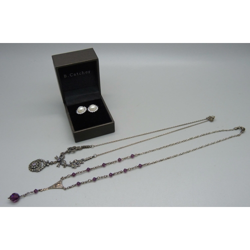 1050 - Two silver necklets and a pair of silver earrings